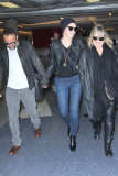 Sharon Stone and boyfriend David DeLuise hold hands through LAX