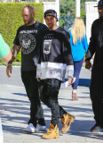 Tyga and his posse arrive at their hotel