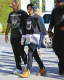 Tyga and his posse arrive at their hotel