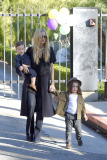 Rachel Zoe and her family attend a birthday party in Brad and Angelina's community