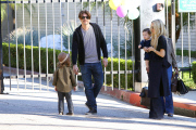 Rachel Zoe and her family attend a birthday party in Brad and Angelina's community