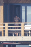 *PREMIUM EXCLUSIVE* **NO WEB** Cara Delevingne sunbathing topless in Malibu