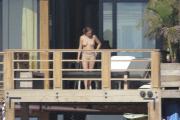 *PREMIUM EXCLUSIVE* **NO WEB** Cara Delevingne sunbathing topless in Malibu