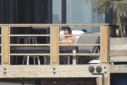 *PREMIUM EXCLUSIVE* **NO WEB** Cara Delevingne sunbathing topless in Malibu