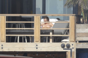 *PREMIUM EXCLUSIVE* **NO WEB** Cara Delevingne sunbathing topless in Malibu
