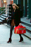 Taylor Swift and her kitties catch a car in the Big Apple