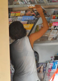 Halle Berry Buys A Stack Of Magazines 
