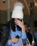 Shy Kendall Jenner Lands At LAX Airport 