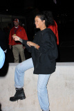 Rihanna is all smiles as she leaves the Super Bowl