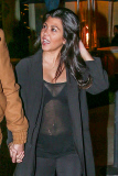 *EXCLUSIVE* **MUST CALL FOR PRICING** Kourtney Kardashian shows off her post-baby body in a sheer top *WEB EMBARGO UNTIL 8AM PST ON 02/03/15*
