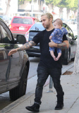 Pete Wentz so happy holding baby Saint 