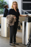 Catherine Deneuve Arriving On A Flight At LAX 