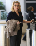 Catherine Deneuve Arriving On A Flight At LAX 