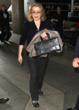 Catherine Deneuve Arriving On A Flight At LAX 