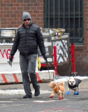 Hugh Jackman bundles for the snow with pups Allegra and Dali
