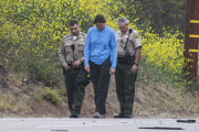 *PREMIUM EXCLUSIVE* *WEB EMBARGO UNTIL 19:00 PST 02/08/15* A shaken Bruce Jenner is given a field sobriety test after a fatal accident