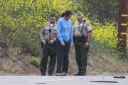 *PREMIUM EXCLUSIVE* *WEB EMBARGO UNTIL 19:00 PST 02/08/15* A shaken Bruce Jenner is given a field sobriety test after a fatal accident