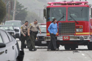 *PREMIUM EXCLUSIVE* *WEB EMBARGO UNTIL 19:00 PST 02/08/15* A shaken Bruce Jenner is given a field sobriety test after a fatal accident