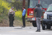 *PREMIUM EXCLUSIVE* *WEB EMBARGO UNTIL 19:00 PST 02/08/15* A shaken Bruce Jenner is given a field sobriety test after a fatal accident