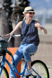*EXCLUSIVE* Naomi Watts cracks a smile and fist bump as she bikes with the family