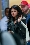 *EXCLUSIVE* Selena Gomez smiles and waves as she returns to film 'The Revised Fundamentals of Caregiving' **NO UK** 