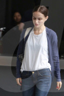 A tired-looking Natalie Portman trudges through her day in Los Angeles