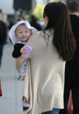 Alec and Hilaria Baldwin take little Carmen on a shopping trip