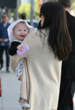 Alec and Hilaria Baldwin take little Carmen on a shopping trip