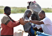 Refugees escape from Boko Haram in Nigeria to Chad, Africa - Feb 2015