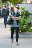 Hilary Duff wears a smile as she shops around town