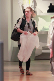 Hilary Duff wears a smile as she shops around town