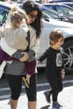 Kourtney Kardashian brings her kids to a birthday party
