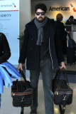 Adam Goldberg takes family snapshots at LAX