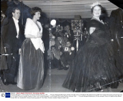 Princess Margaret / Lord Snowdon And Queen Mother February 1961....... Princess Margaret Wearing An Off-the-shoulder Dress Of Kingfisher Blue Belvet Arrives With Her Husband Mr. Antony Armstrong-jones At The Odeon Cinema Leicester Square London Last