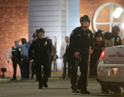 Officers shot outside Ferguson Police Station