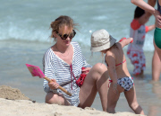 Uma Thurman builds sandcastles on the beach in St Barts