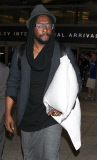 Will.i.am arrives at LAX looking sleepy
