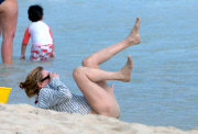 Uma Thurman made a roll in the sand in St Barts
