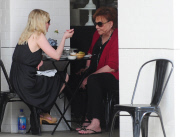 Kirsten Dunst dodges pregnancy rumors as she shows off a hint of belly