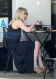 Kirsten Dunst dodges pregnancy rumors as she shows off a hint of belly