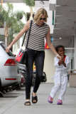 Doting mom Charlize Theron picks up her little man Jackson from karate class