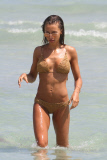 Italian beauty Alessia Tedeschi gets wet and wild with a gal pal in Miami