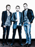 portrait of the english rock pop group muse in studio with Matthew Bellamy Dominic Howard Christopher Wolstenholme 2012/07 Credit : CAMHI/VISION/DALLE