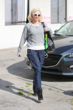 Chic mama Gwen Stefani looks stylish while dropping by her custom tailor 