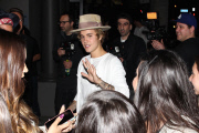 Justin Bieber greets a crowd of fans at Bar 20