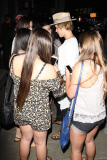 Justin Bieber greets a crowd of fans at Bar 20