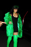 Rihanna Rocks Versace Green Fur Coat & Thigh-High Boots to dinner in L.A.