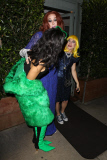 Rihanna Rocks Versace Green Fur Coat & Thigh-High Boots to dinner in L.A. - Part 2