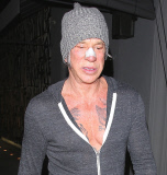 Mickey Rourke leaves Craig¿s Restaurant with a bandage on his nose
