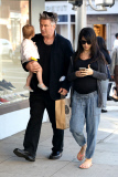 Alec Baldwin plants a big Kiss on baby Carmen